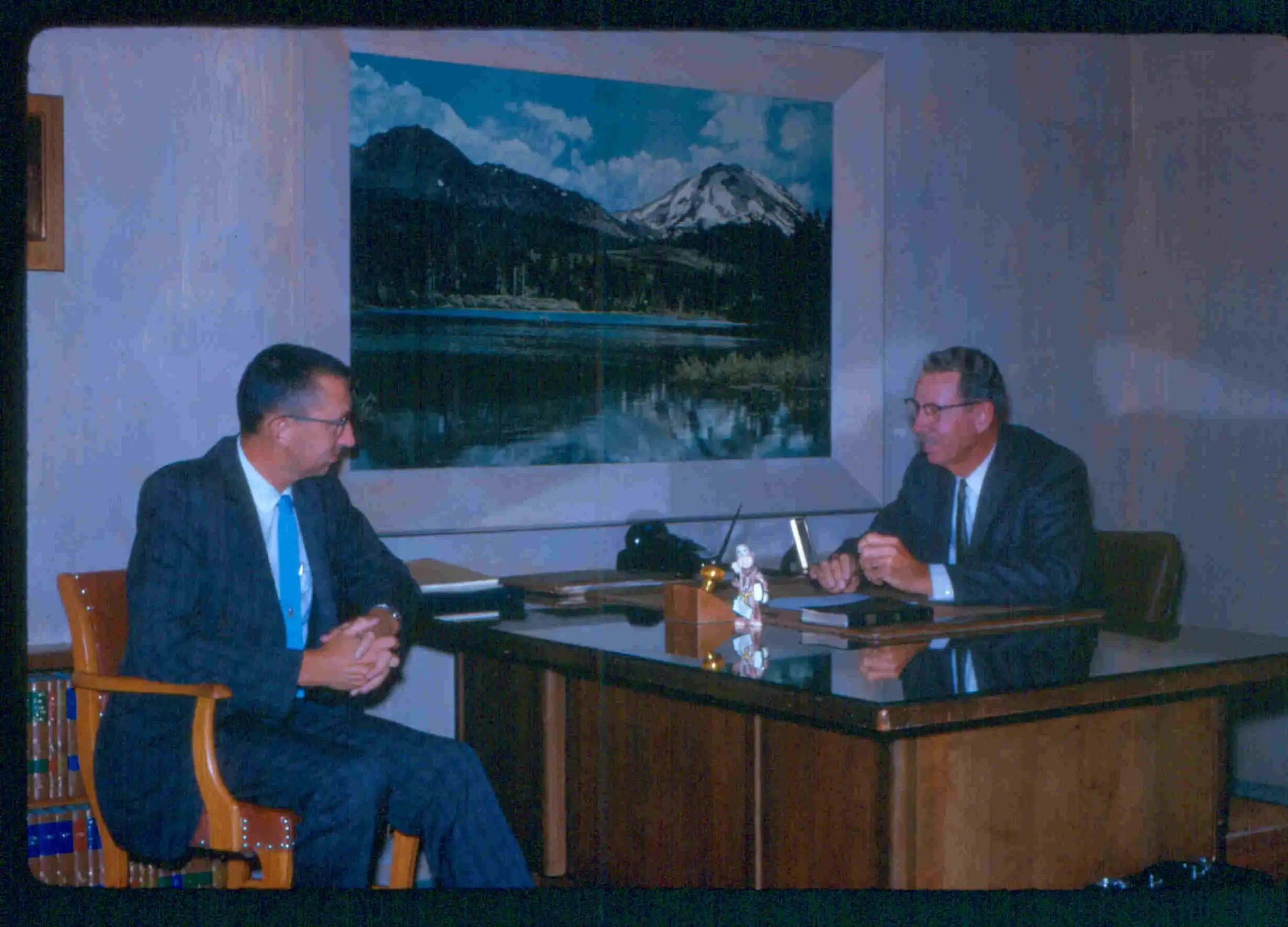 Dr. Congdon and Mike Graham seated at a desk in the church office